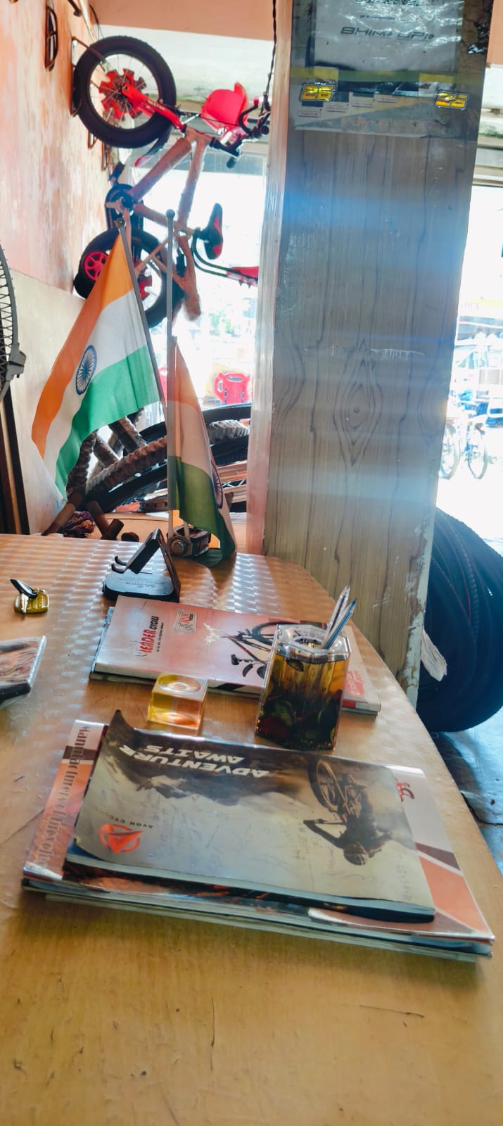 MS CycleShop counter with Indian flag